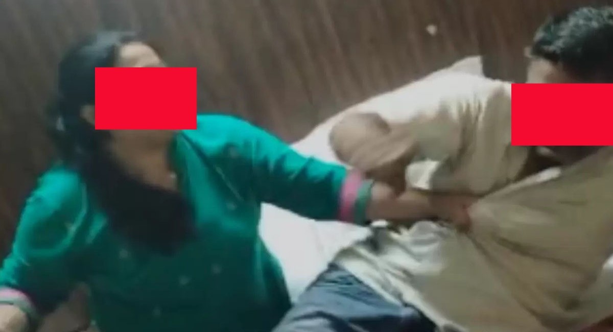 wife beaten up husband on road over illicit relation with domestic helper